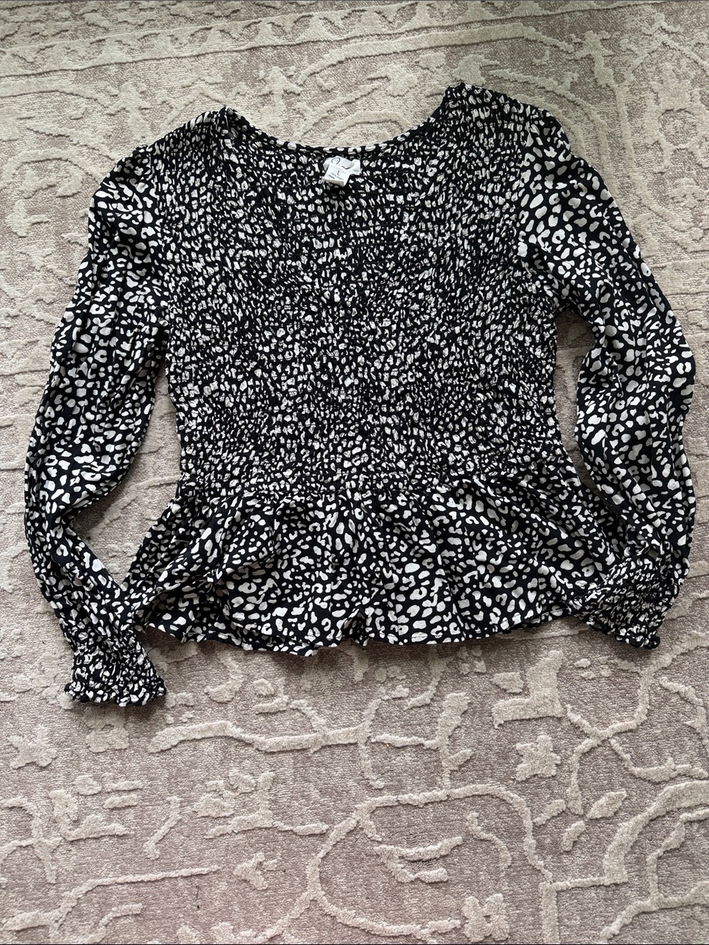 Black and White Leopard Smocked V-Neck Peplum Blouse with Long Sleeves